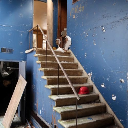 abandoned-stairway-with-peeling-blue-paint-and-har-2026-01-11-10-28-58-utc